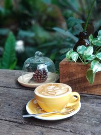 Close-up of cappuccino on wooden table