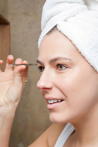 Close-up portrait of woman holding ice cream
