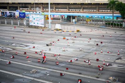 High angle view of vehicles on road in city