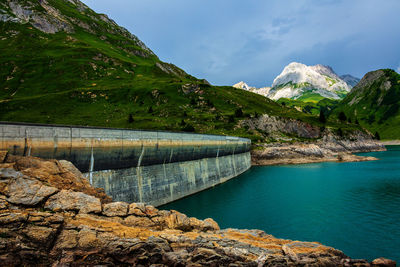 Scenic view of dam against sky