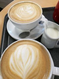 High angle view of cappuccino on table