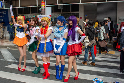 Group of people at street in city