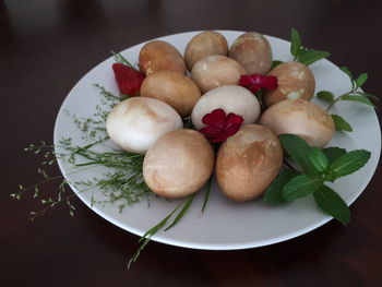 High angle view of fruits in plate on table