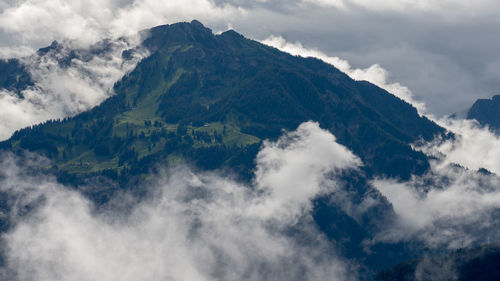 Low angle view of mountain range against sky