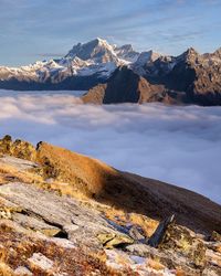 Scenic view of snowcapped mountains against sky