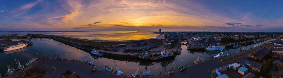 High angle view of city at sunset