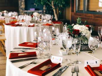 Flower vase on table in restaurant