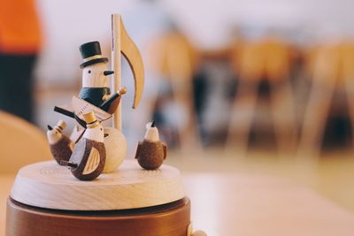 Close-up of guitar on table