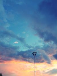 Low angle view of cloudy sky at sunset