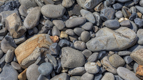 Full frame shot of pebbles on beach