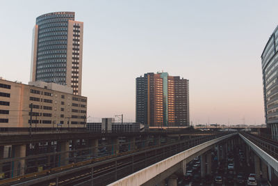 Low angle view of skyscrapers against clear sky