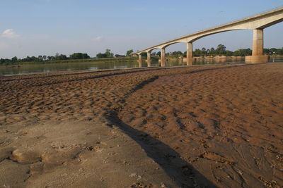 Bridge over land against sky