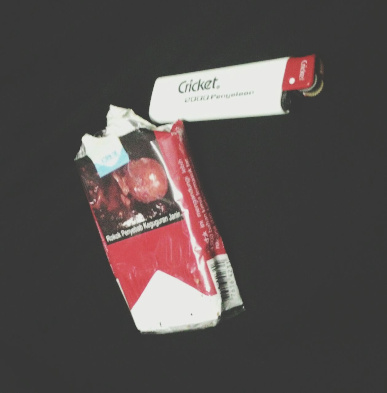 red, communication, still life, text, indoors, close-up, high angle view, studio shot, western script, copy space, no people, black background, paper, white color, night, single object, table, guidance, heart shape, capital letter