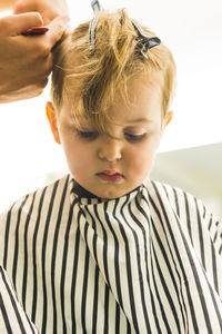 Boy getting haircut