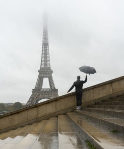 Full length of a tower in rain