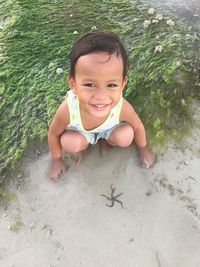 Portrait of smiling boy in water