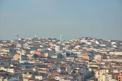 View of cityscape against clear sky