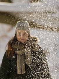 Portrait of a smiling girl in snow