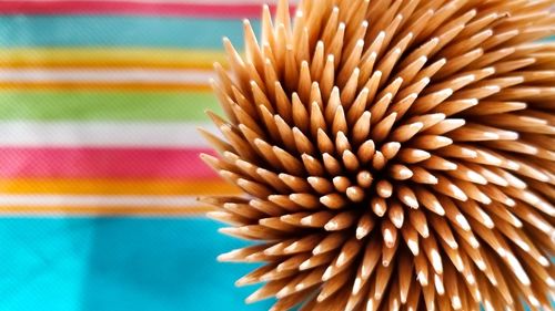 Close-up of multi colored pencils on table