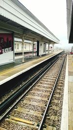 Railroad station platform against sky