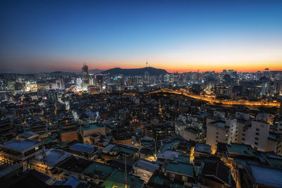 Sunset view over seoul city with view of n seoul tower. taken from changsindong, seoul, south korea