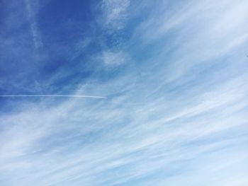 Low angle view of vapor trail in sky