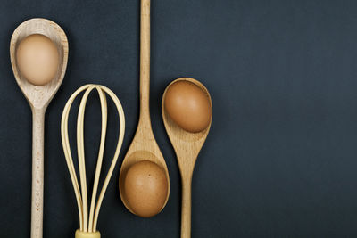 Directly above shot of wooden spoons on table