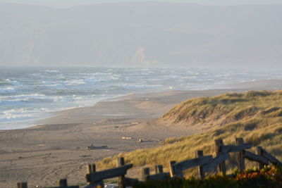 Scenic view of beach against sky