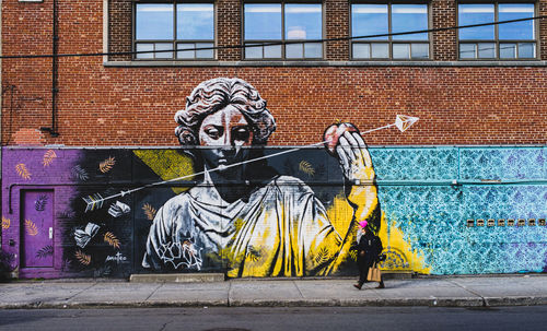 Graffiti on wall against building