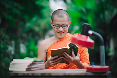 Portrait of young man using mobile phone