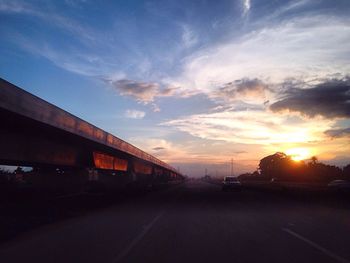 Road against sky during sunset