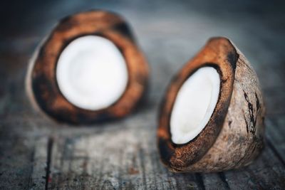 High angle view of halved coconut