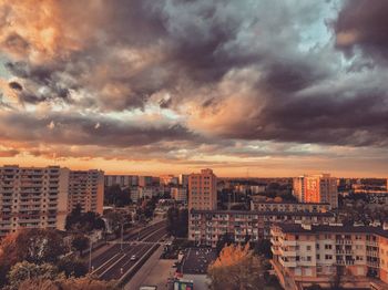 High angle view of cityscape against storm clouds
