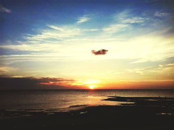 Scenic view of sea at sunset