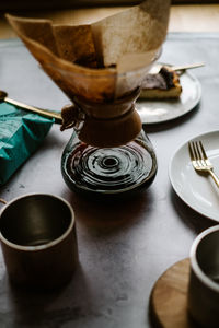 High angle view of coffee cup on table