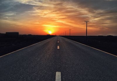 Road against sky during sunset