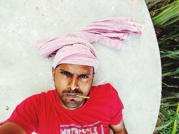 Portrait of young man wearing bandanna