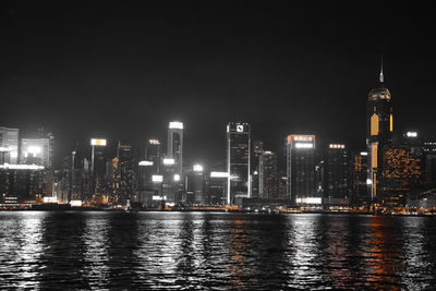 Illuminated buildings in city at night