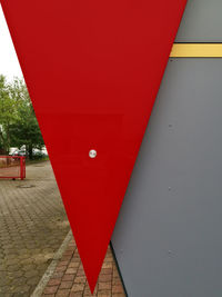 Close-up of red sign on wall