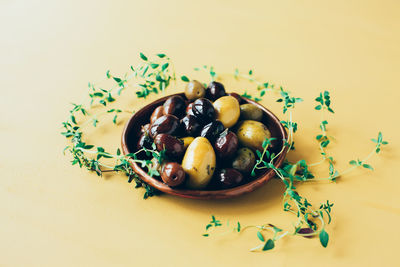 High angle view of fruits in plate on table