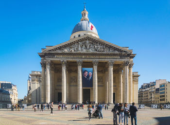 Group of people in front of building