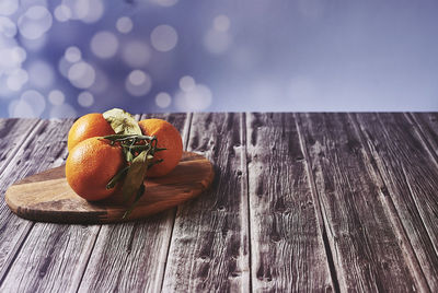 Close-up of orange fruit on table