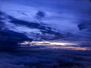 Low angle view of clouds in sky at sunset