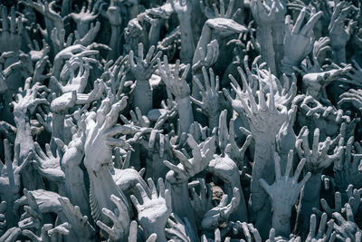 Full frame shot of human hand sculptures