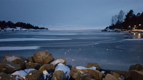 Scenic view of frozen sea against sky