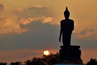 The buddha  during sunset in bangkok. 