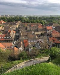 Houses in town against sky