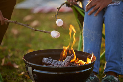 Midsection of man preparing food