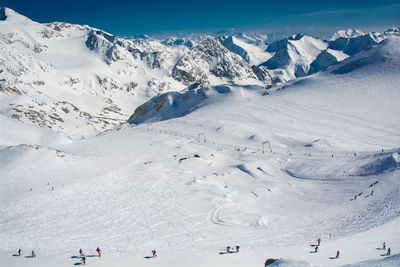 Group of people on snowcapped mountain