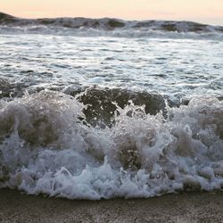 Close-up of waves on beach